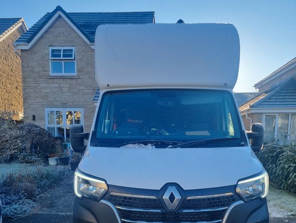 removals van outside house on a cold day