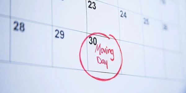 white calendar moving day red circle on the 30th