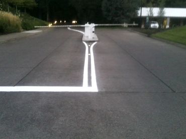 image displaying white lines on the road