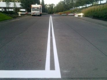 Image displaying van along with the road