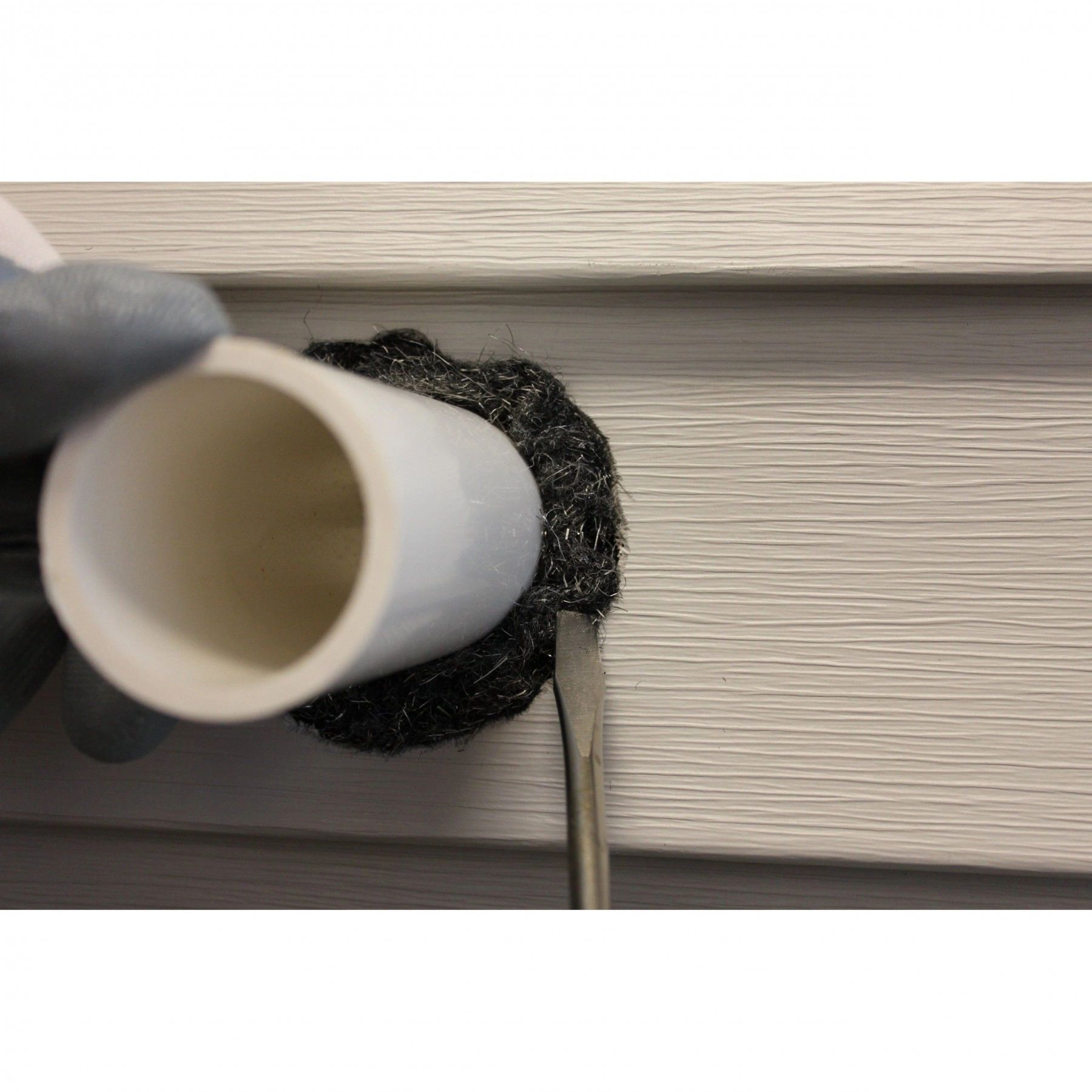 Blocking  a hole around a pipe