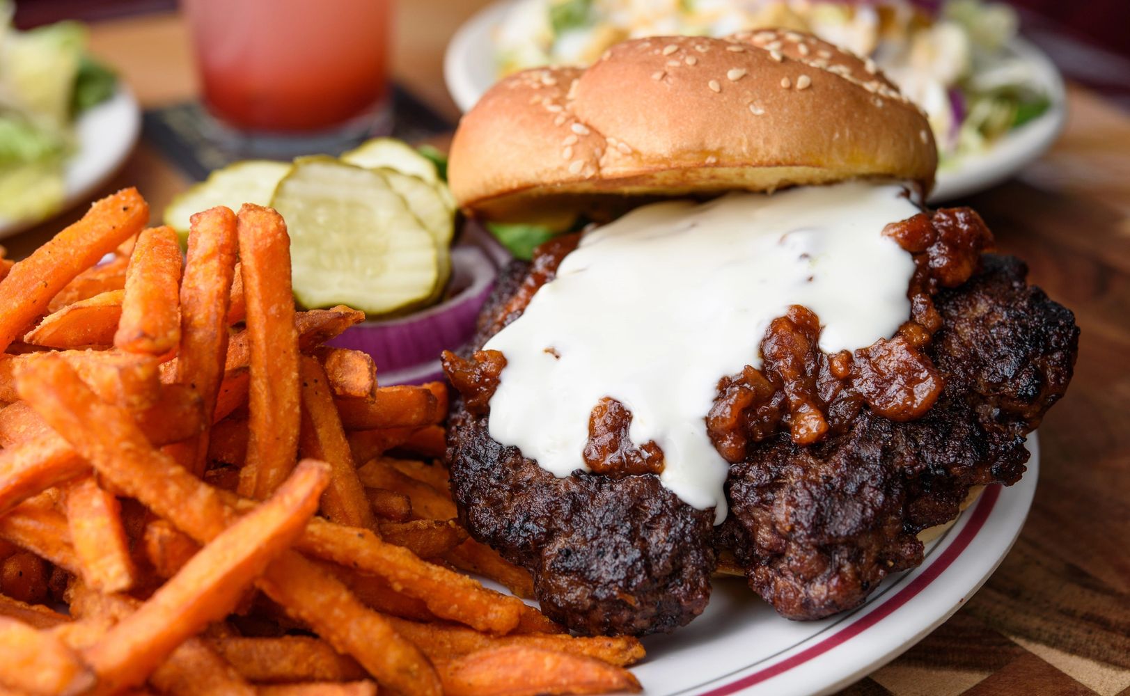 Bourbon bacon jam burger and sweet potato fries