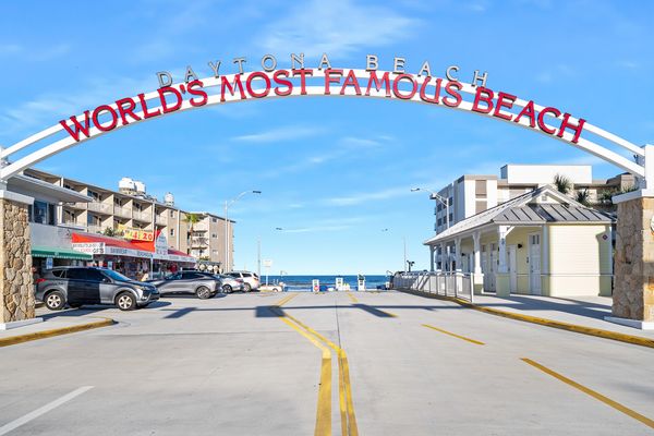 Entrance archway to Daytona Beach, labeled 'World's Most Famous Beach'.