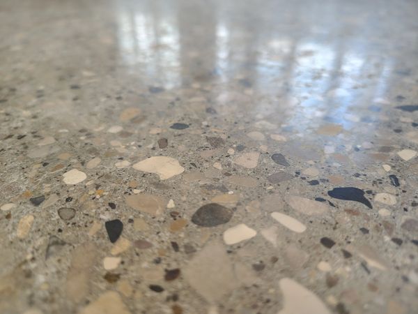 Close-up of polished terrazzo floor.