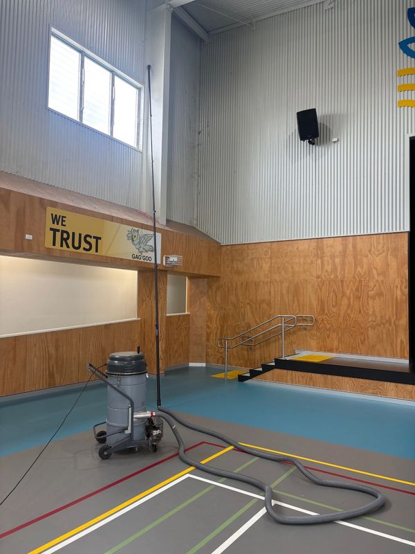 Palmview Primary School high reach vacuum of basketball court with a commercial twin engine vacuum