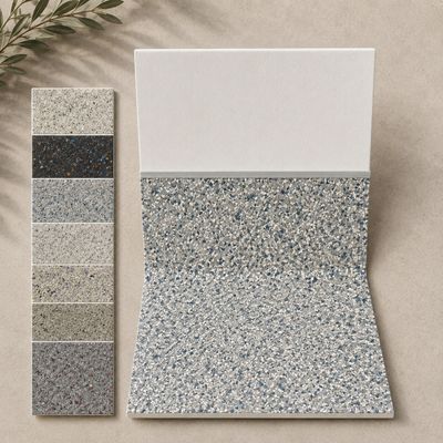 Sample tiles with terrazzo patterns in various colors on a neutral background.