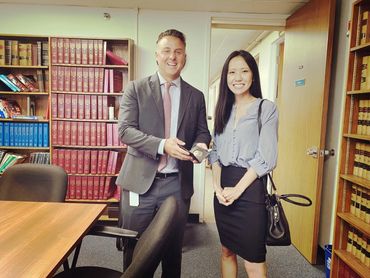 SA J. Hanley swears in ASA Allison Cho.