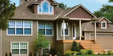 Edco Steel Siding in Board & Batten and 6 inch lap siding.