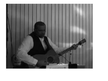 Afrostotle playing the bass