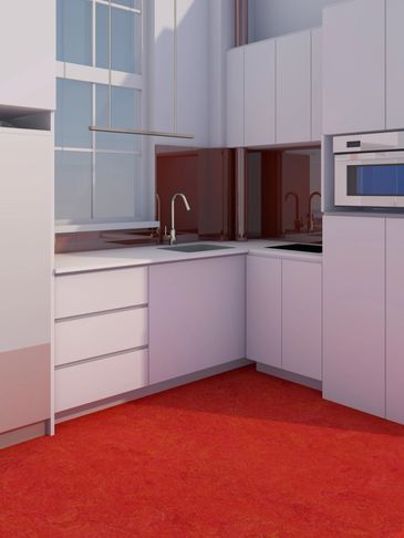 Modern white kitchen with red carpet and built-in appliances.