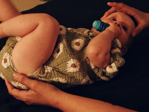 Baby receiving a Gentle Baby Massage with Craniosacral Fascial Therapy (CFT)