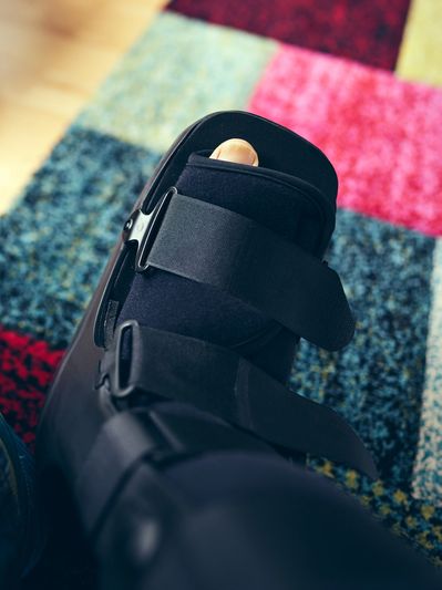 Injured foot in a protective walking boot