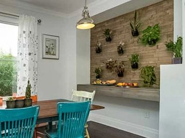 feature wall and green wall with custom drawers renovation Ottawa