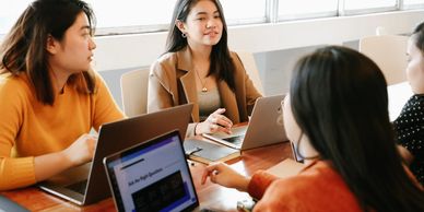 lawyers meeting with laptops