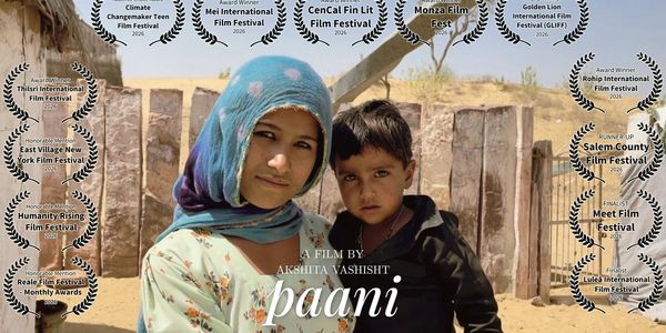 A young woman and child in a rustic setting, featured in the film 'Paani'.