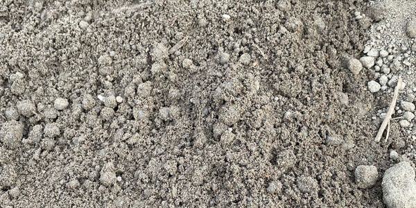 Fill Dirt: economical solution for establishing grade and fill needs around homes, yards, buildings