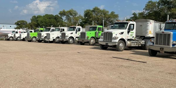 Fremar Corporation's fleet includes tandem dump trucks, end dumps, and belly dumps