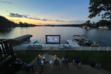 Large 3 Dock Weardeck fixed dock custom built with tv projector.