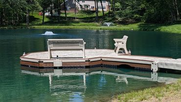 Custome Wave Armor Floating Dock with Weardeck Accents installed on a private pond in northeast Ohio