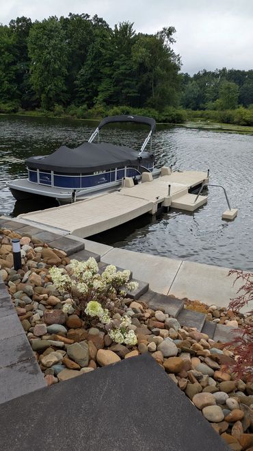 Floating dock with Kayak Assist installed on Portage Lakes by AquaLife Construction.