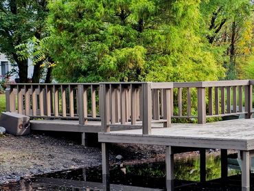 WearDeck waterfront dock at a private Ohio pond by AquaLife Construction.