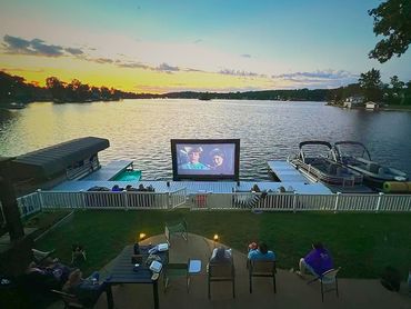 Large fixed Weardeck custom Dock built with tv projector.