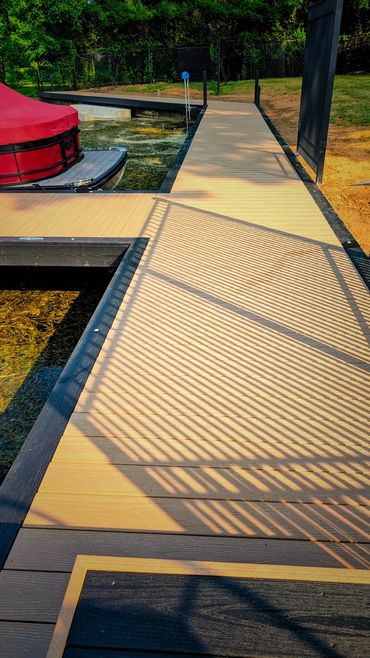 Custom boardwalk dock installation on Mud Lake providing a stable, low-maintenance waterfront.