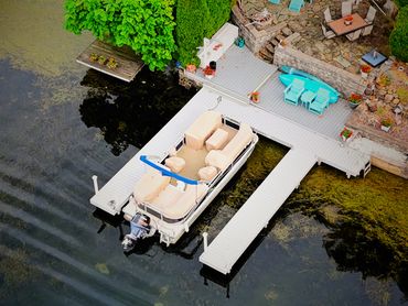 Custom fixed Weardeck Dock on North Reservoir designed for changing water levels and recreation.