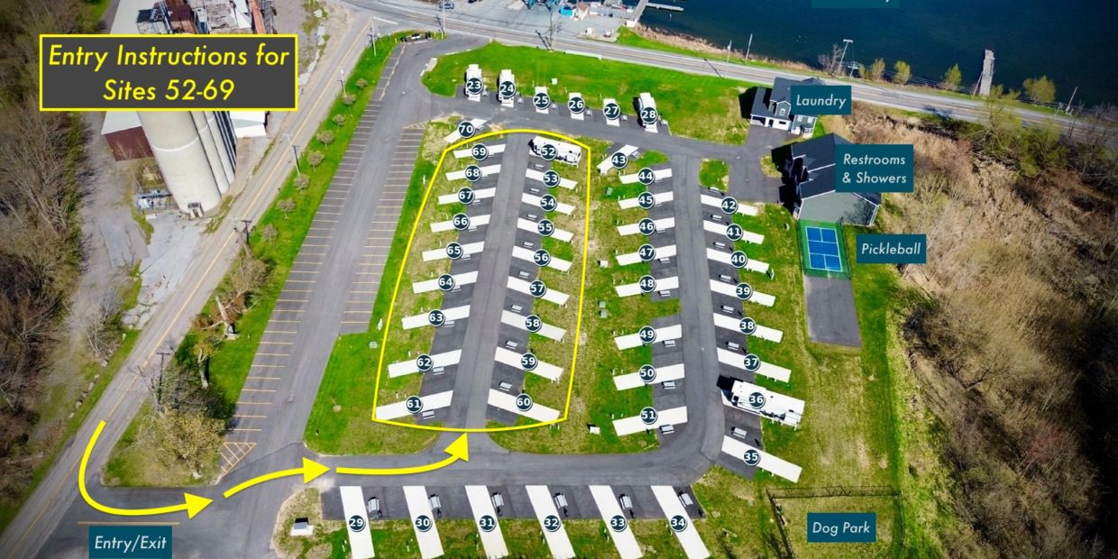 Aerial view of campground with numbered sites and labeled amenities.