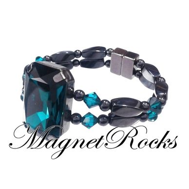 Bracelet features Magnetic Hematite, Emerald Crystal by Swarovski ® and a Magnetic Jewelry Clasp.
