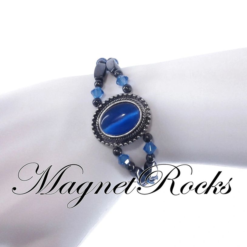 Bracelet features Magnetic Hematite, Sapphire Crystal by Swarovski ® and a Magnetic Jewelry Clasp.