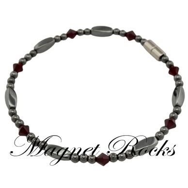 Magnetic Siam Anklet features Siam Crystal by Swarovski® and Magnetic Jewelry Clasps.
