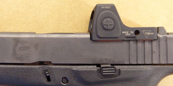 Glock 43 with RMRcc red dot slide cut.