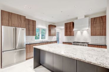 sleek and modern walnut cabinetry, where the wood grain is meticulously matched