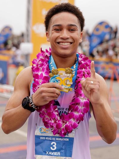 2025 OC Marathon 1st place with a time of 2:23:41.