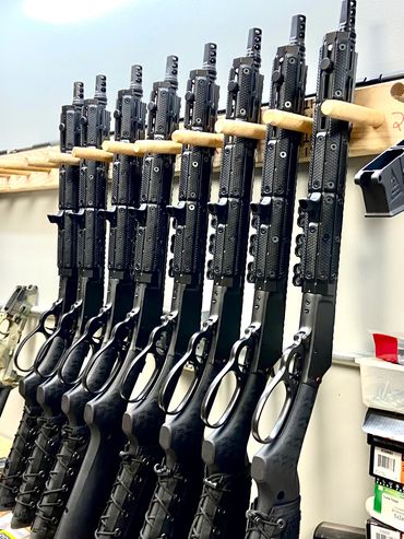 Mad Pig Tracker rifles for John Wick 4 in various stages of completion prior to being shipped to Mr.