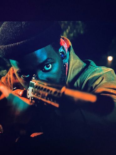 Screen grab of actor who played the Tracker "Mr. Nobody" Shamier Anderson with the Mad Pig Tracker r