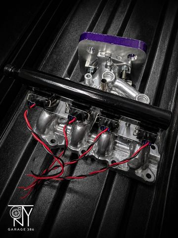 Car engine intake manifold with wiring.