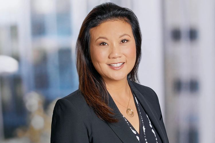 Photo of Diana Iketani (Asian woman in business attire)