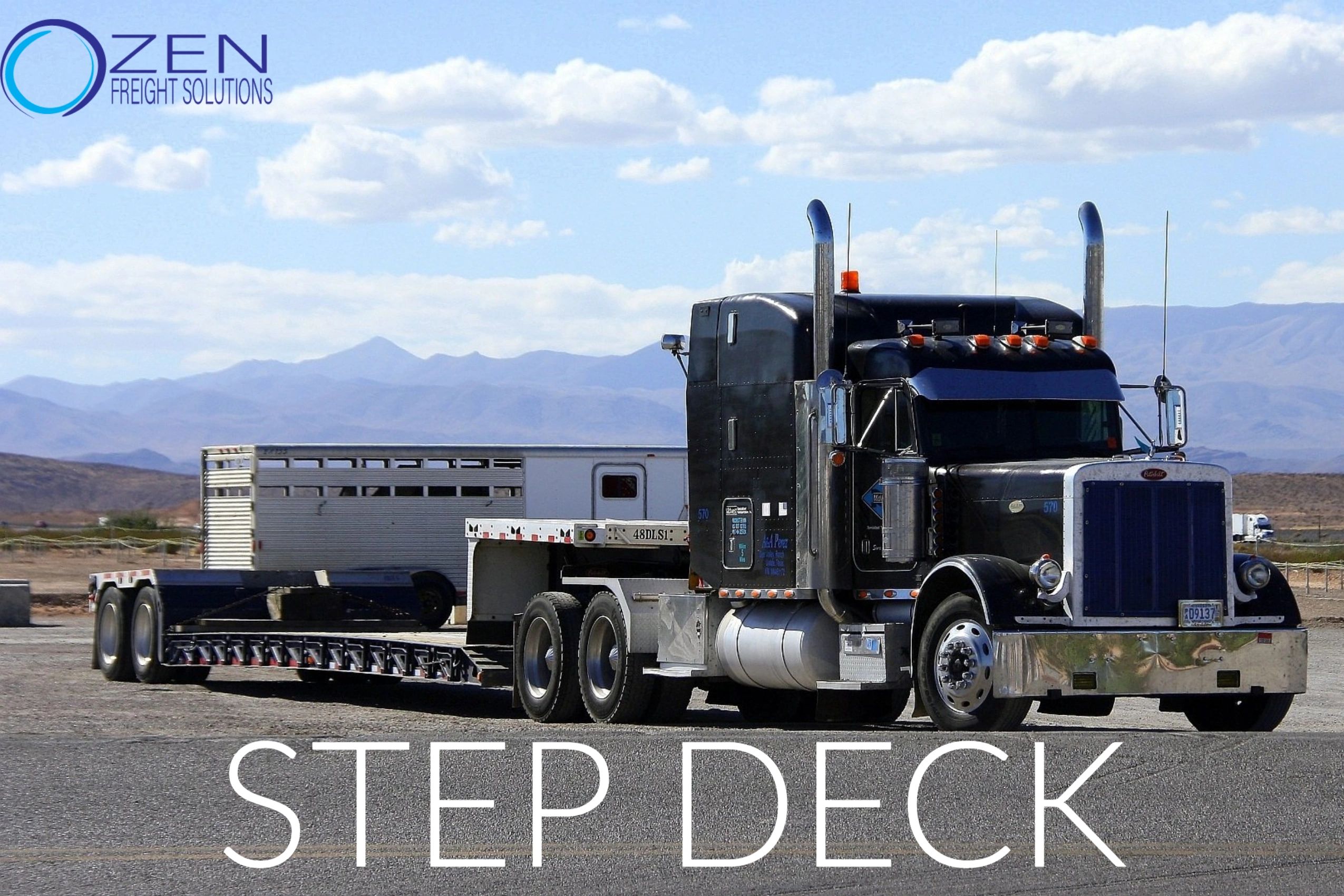 Step-deck truck in front of a blue sky