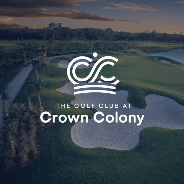 Golf course at Crown Colony during sunset.
