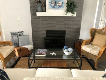 Boat slip watercolor art painting in living room on wall in a beach home