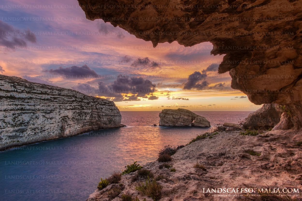 The fungus rock at sunset. sunset from dwejra san lawrenz at sunset photography. caves in Gozo Malta