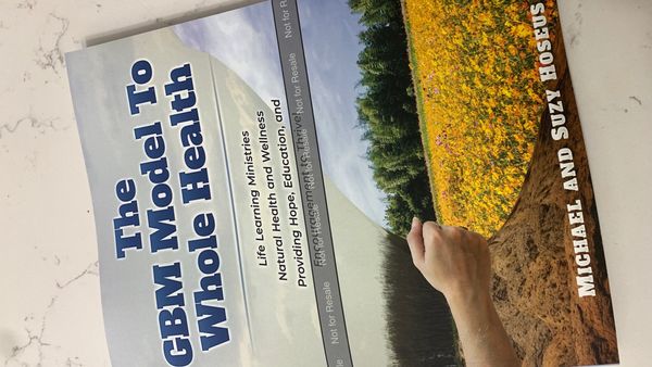 Book cover of 'The GBM Model To Whole Health' focusing on health and wellness.