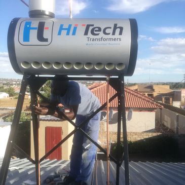 our plumber Timothy installing a solar water heater(solar geyser)