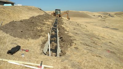 A pressure distribution leach field under construction in Byron, CA. Homeowners DIY septic install.