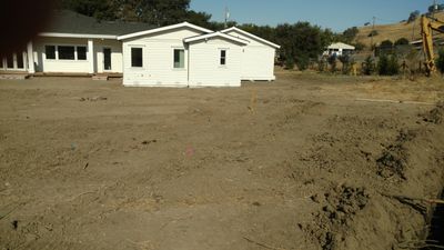 This new construction house is just about getting a pressure distribution leach field installed.