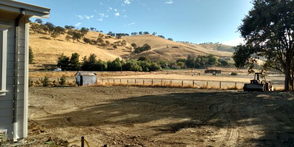 A recently installed leach field in Clayton, CA. Notice the new house and recent leach field.