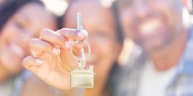 first time homebuyer receiving keys to new home in Florida