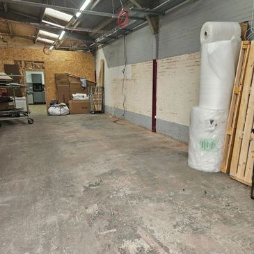 AN EMPTY INDUSTRIAL UNIT THAT HAS BEEN CLEARED BY WASTE BUSTERS STAFFORDSHIRE